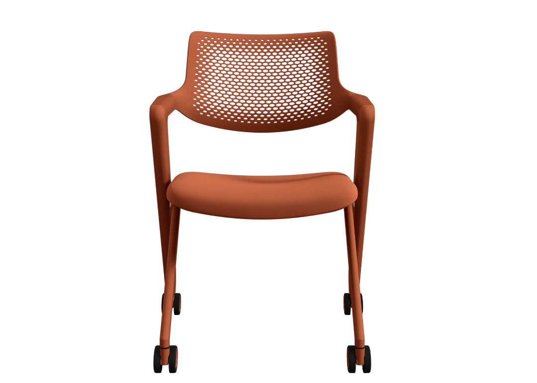 Oraange chair with a perforated backrest on a white background